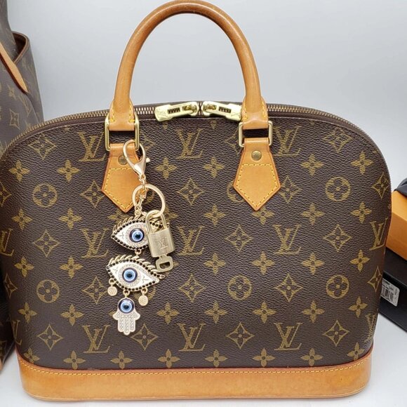Authentic Louis Vuitton Lock & Key with unbranded Eyes Bagcharm,Keychain - Picture 7 of 7